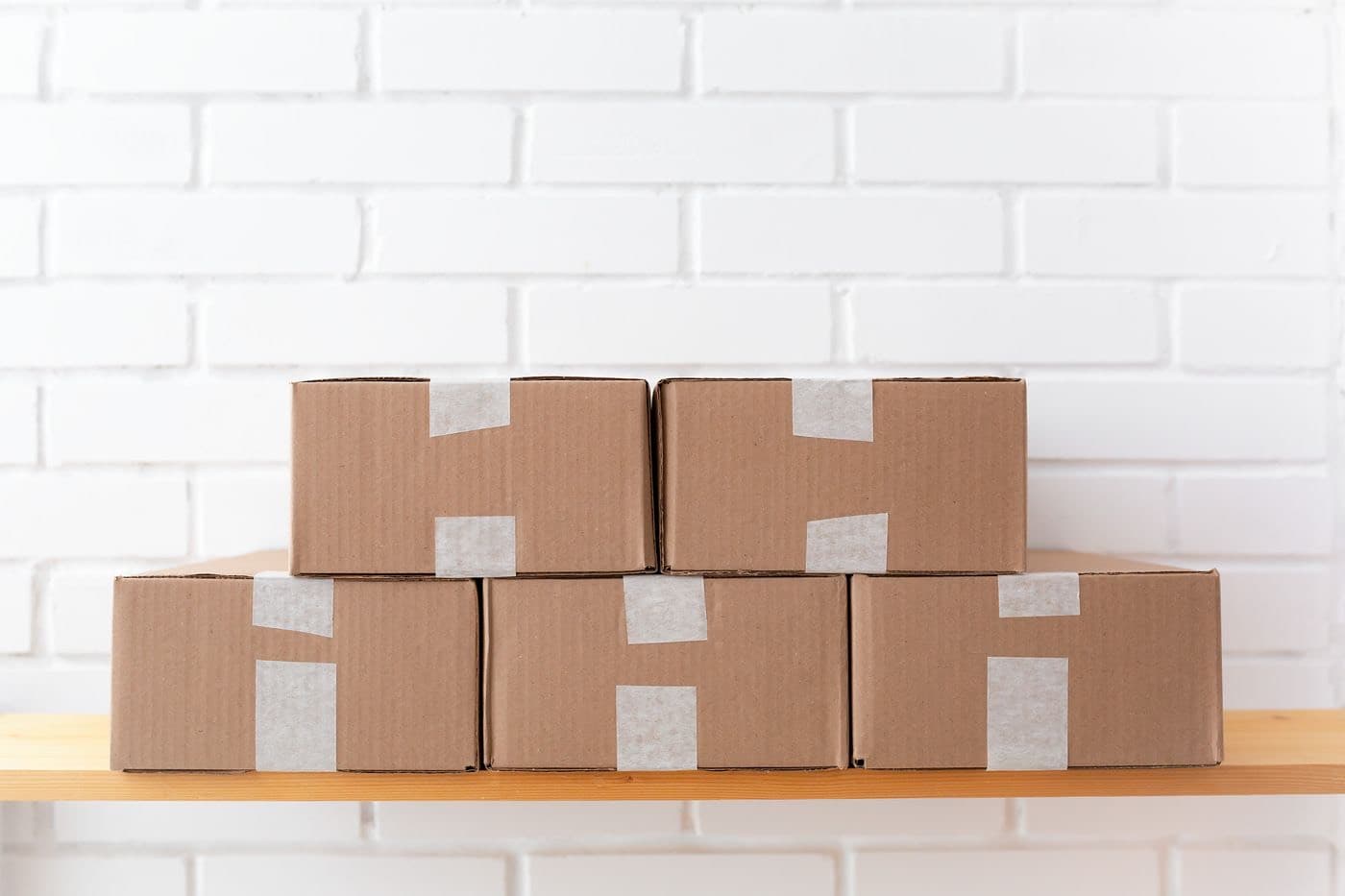 Printed corrugated shipper cartons stacked for dispatch