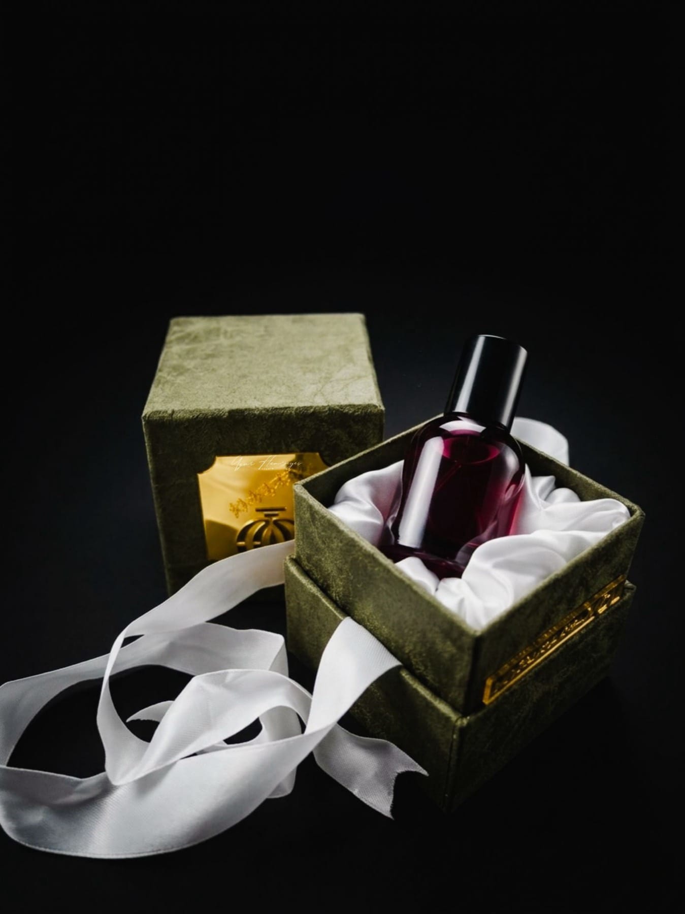 Premium rigid gift box with foil detailing and ribbon closure